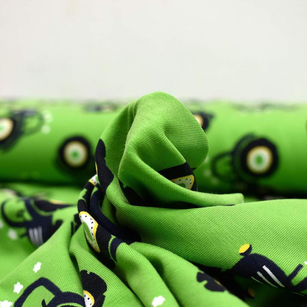 MAGAM-Stoffe Traktor Ben kiwi-grün Jersey Stoff Oeko-Tex Meterware 50cm